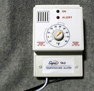 temperature alarm for backflow enclosure